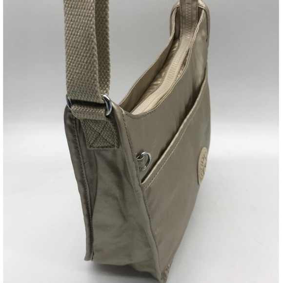 🦧Aisling Kipling 🦧
Metallic Crossbody
 Front flap pocket like new!🦧 - Picture 4 of 6
